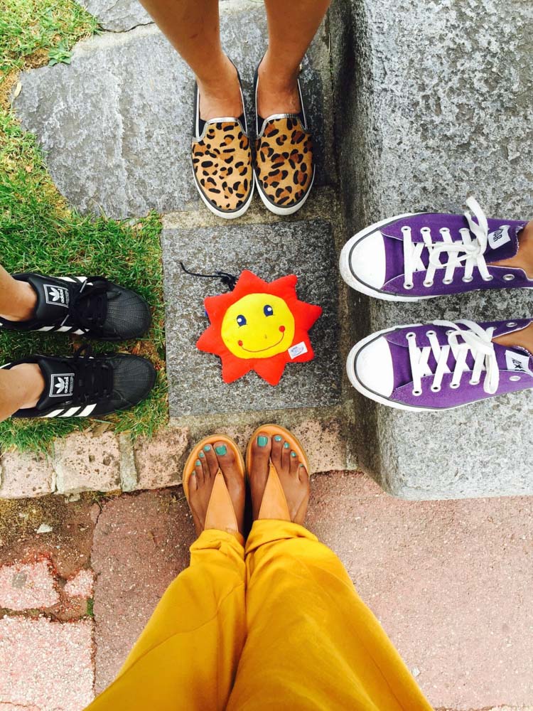 Aerial shot of friend's shoes