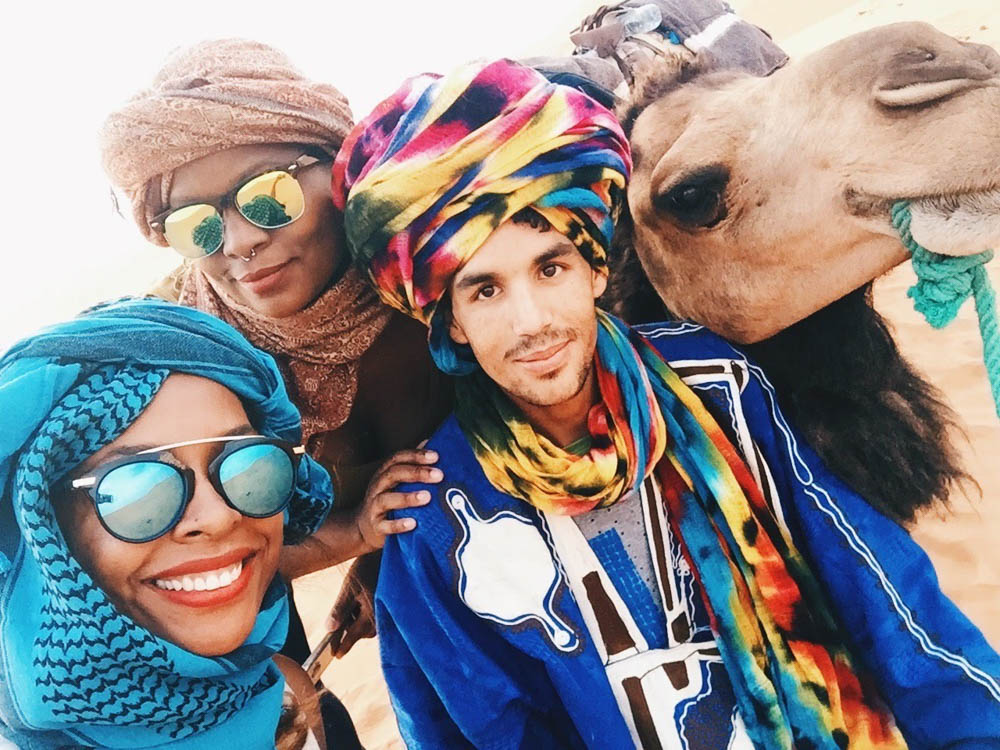 Sahara Desert with guide and camel